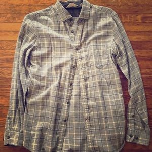 Long sleeve grey flannel shirt.
